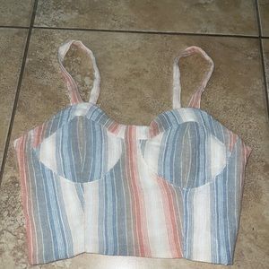 Crop top from Charlotte Russe, size medium, colors pink, blue, white, & beige.